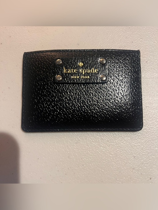 kate spade Handbags - kate spade Black Leather Slim Card Case with Gold Logo with Flaw!